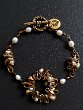 CIRCLES BRACELET Price 350€ - Precious bracelet with spacers in gold bronze, pearls and natural micro-pearls.
