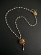FLORENTIA PENDANT NECKLACE Price 150€ - Gold bronze pendant necklace and glass beads rosary.